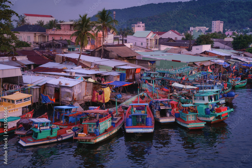 Phu Quoc island in Vietnam at sunset. Fishing boats in Duong Dong city