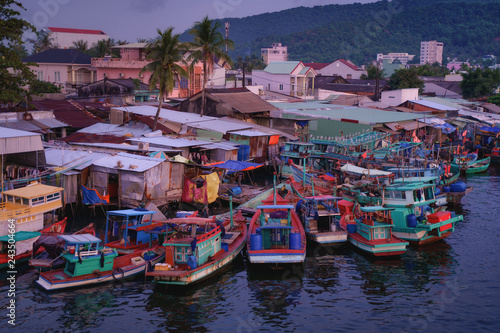 Phu Quoc island in Vietnam at sunset. Fishing boats in Duong Dong city