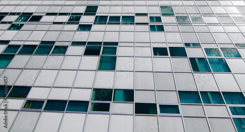 Looking up on a large building or city Media business and investment