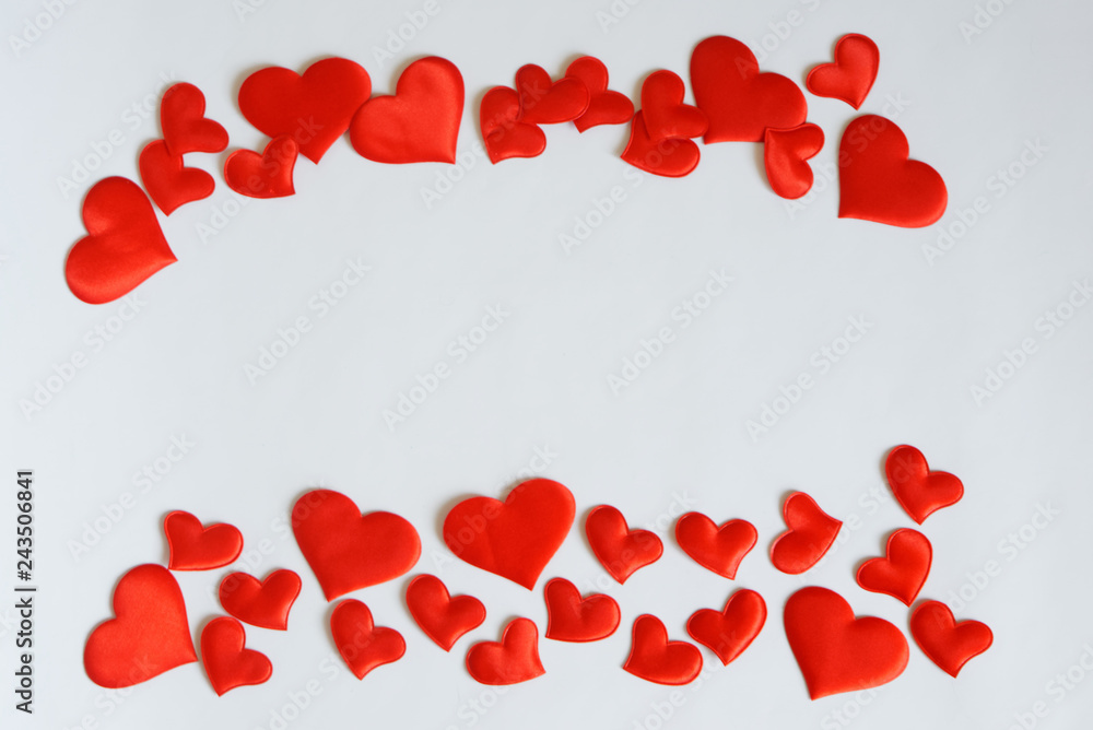 Red hearts frame a white sheet. Free space for recording Valentines Day greetings and love confessions