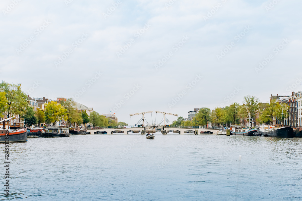 Naklejka premium Amsterdam, Netherlands September 5, 2017: canals and rivers. City landscape. Tourist place. Sights.