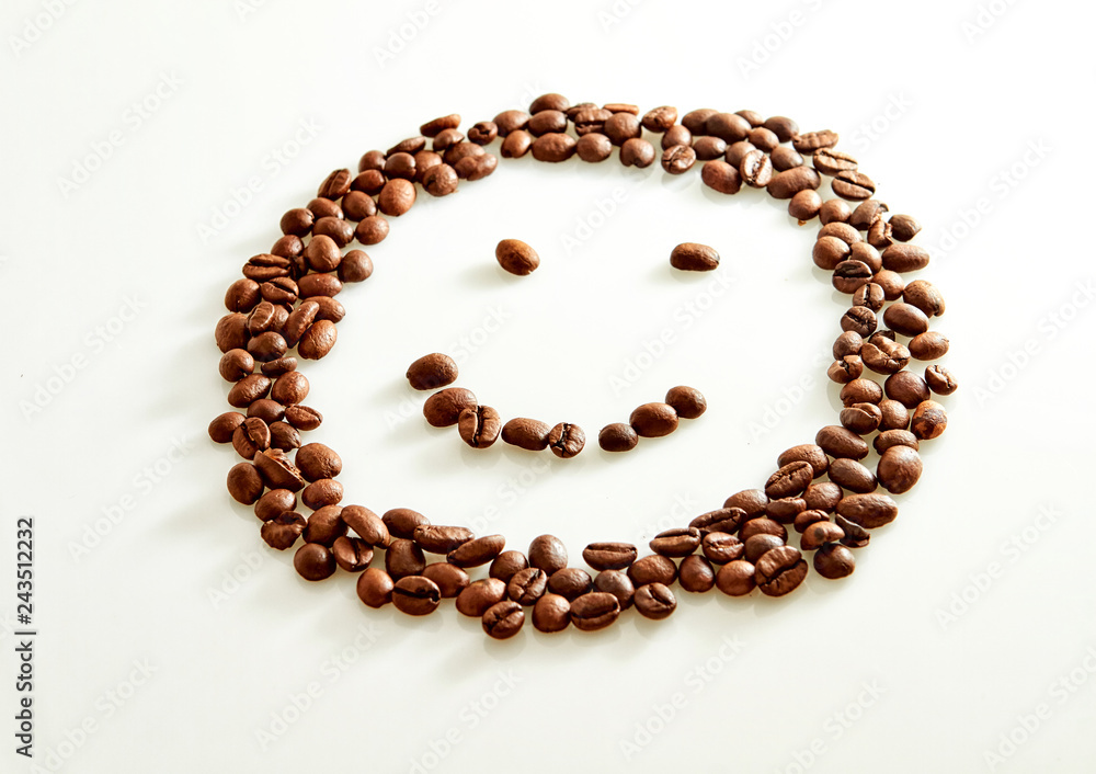 Smile shaped coffee beans isolated on white background Smile shaped coffee beans isolated on white background