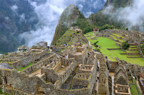The Mysterious Incan Citadel of Machu Picchu in the mist, Cusco Region, Urubamba Province, Peru 