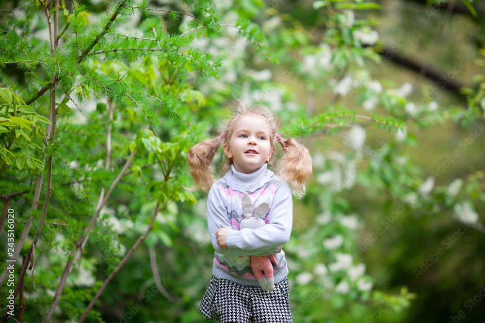 Little cute girl walking in summer park, outdoor Little cute girl walking in summer park, outdoor