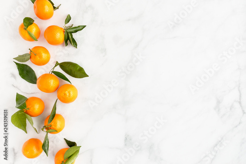 Composition of Clementines on White Marble Background © tinasdreamworld