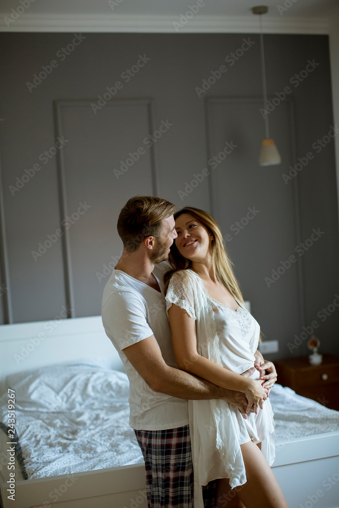 Loving couple huging in the room Loving couple huging in the room