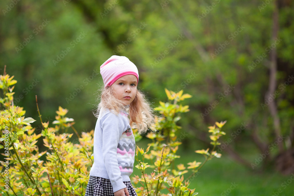 Little cute girl walking in summer park, outdoor Little cute girl walking in summer park, outdoor