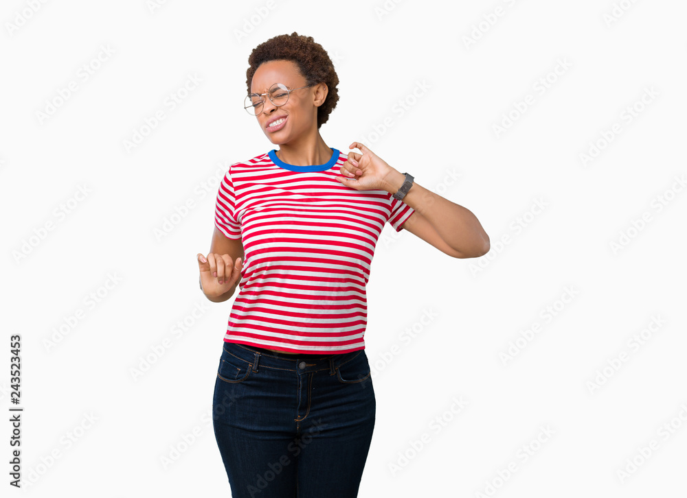 Beautiful young african american woman wearing glasses over isolated background stretching back, tired and relaxed, sleepy and yawning for early morning Beautiful young african american woman wearing glasses over isolated background stretching back, tired and relaxed, sleepy and yawning for early morning