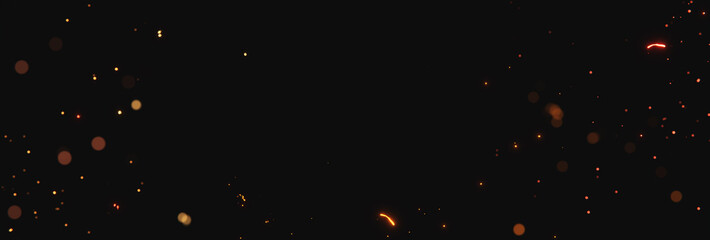 blurred glow sparks from fire at the edges with blank spot on black backgound