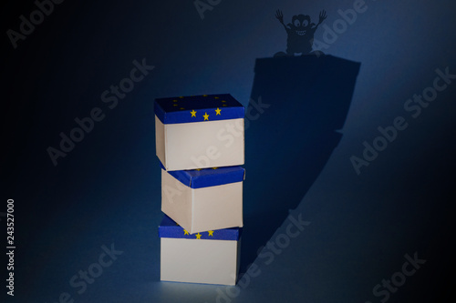3 European boxes with a monster on the shadow