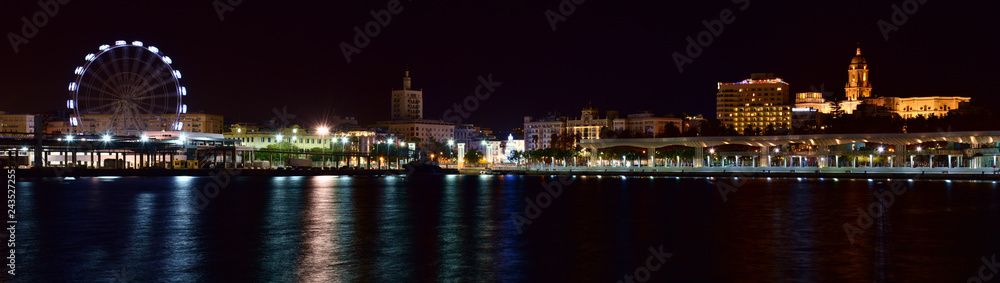 view from port of malaga by night