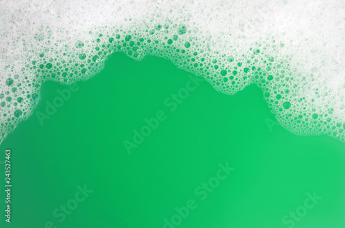 Fotografija green water with a white foam frame