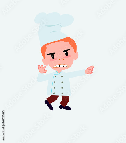 Chef points angrily to his left.