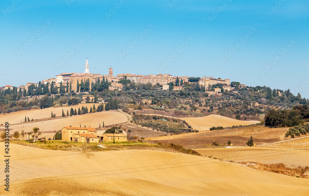 Distant view of Pienza old town on a Tuscany hill, Italy.