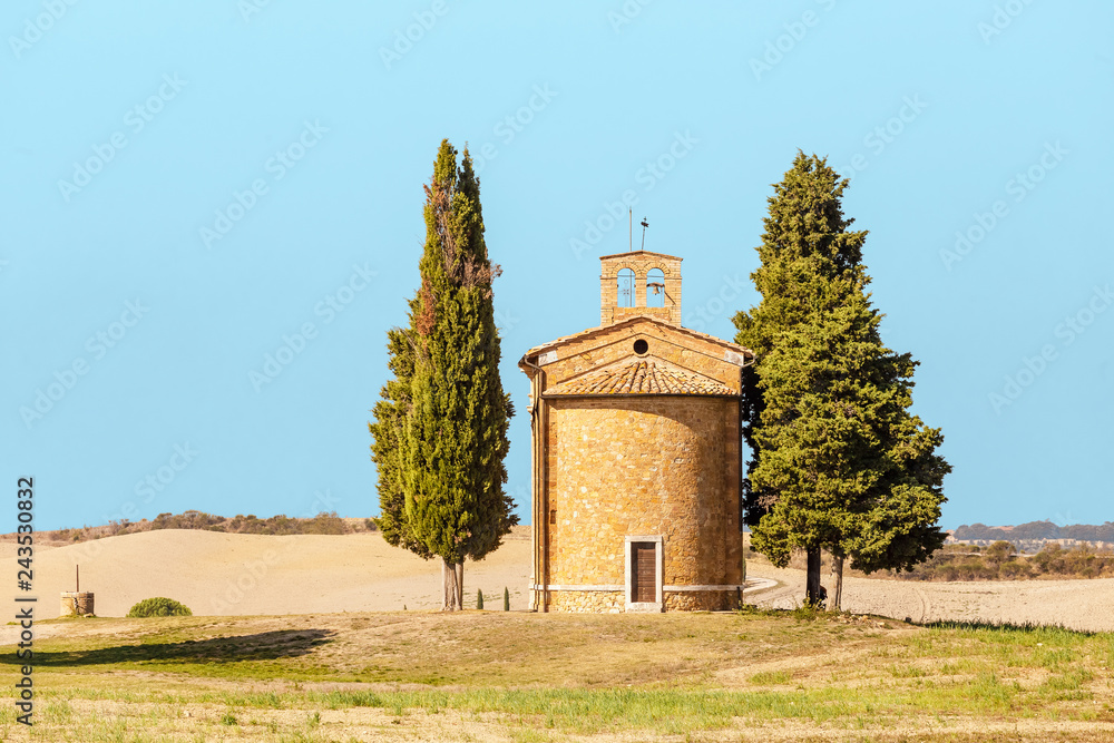 Scenic landscape with old chapel in Tuscany, Italy at autumn