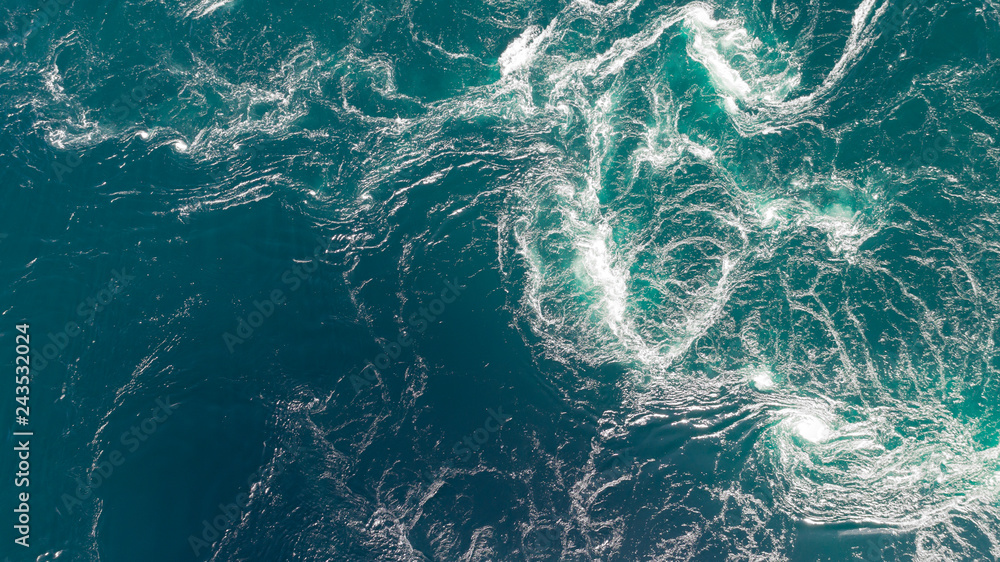 Abstract water currents, rapids and whirlpools in ocean.