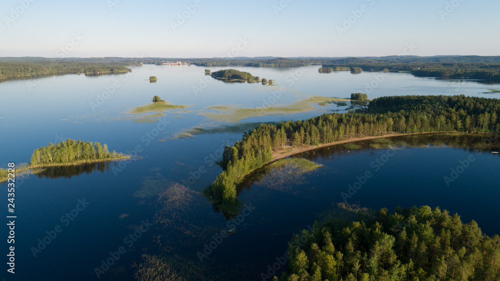 Aerial panorama of beautiful islands and the beach on the lake Mammenselka. Finland	