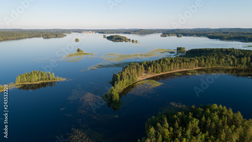 Aerial panorama of beautiful islands and the beach on the lake Mammenselka. Finland 