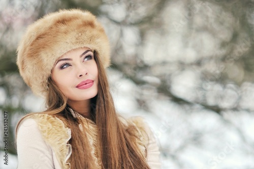 Portrait of a beautiful girl in winter - close up