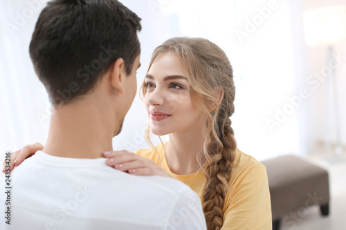 Cute young couple dancing i...