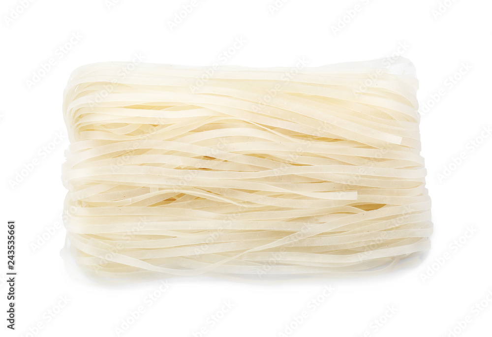 Raw rice noodles on white background, top view