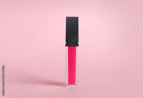 Beautiful liquid lipstick on color background. Decorative cosmetics © New Africa