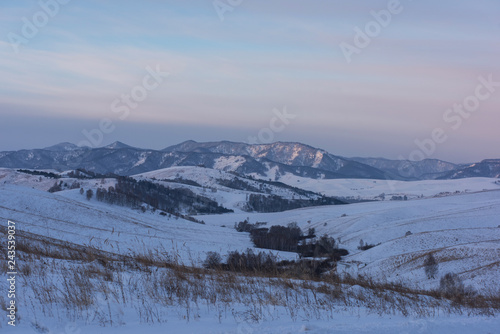 Altai mountains winte road through mountains pass