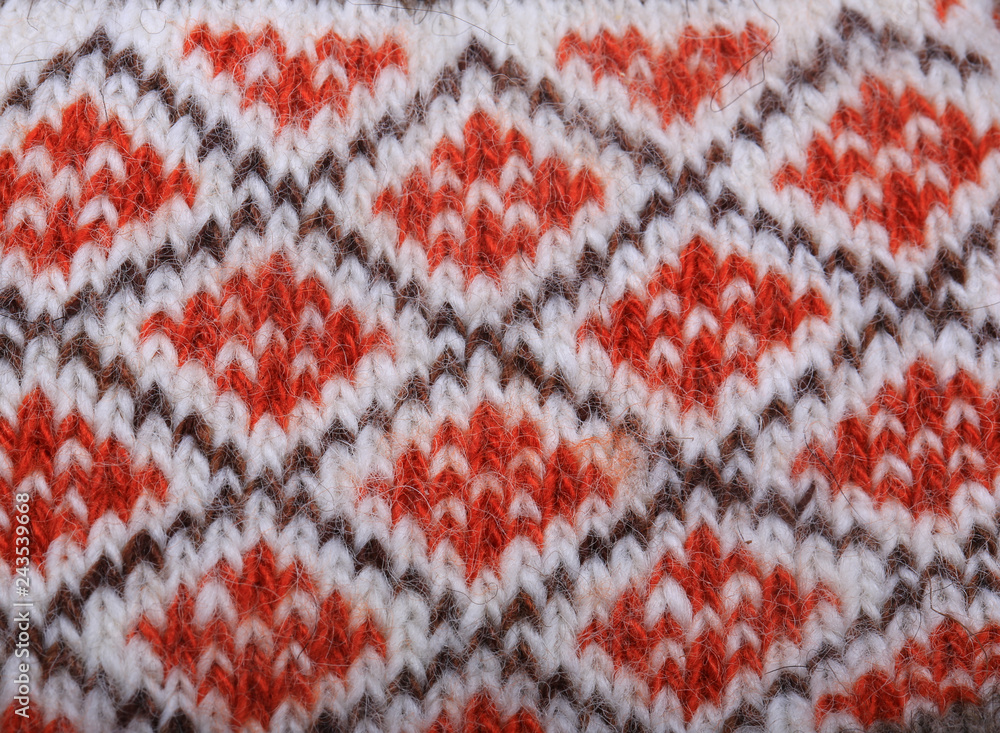 warm christmas background. knitted wool pattern