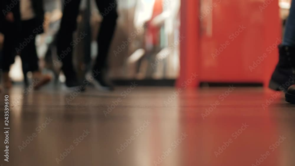 shopping people in motion blur legs of crowd man woman man, unrecognizable fashion group christmas market