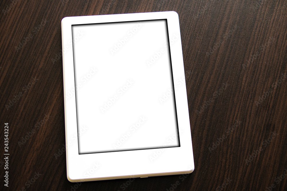 Minsk, Belarus - January 10, 2019: An Amazon Kindle lying on a tabletop. Amazon Kindle devices enable users to browse, buy, download, read e-books, newspapers and other digital media. Minsk, Belarus - January 10, 2019: An Amazon Kindle lying on a tabletop. Amazon Kindle devices enable users to browse, buy, download, read e-books, newspapers and other digital media.