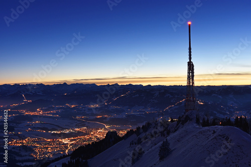City night lights of Sonthofen and Oberstdorf after sunset. Allgäu Alps, Bavaria, Germany