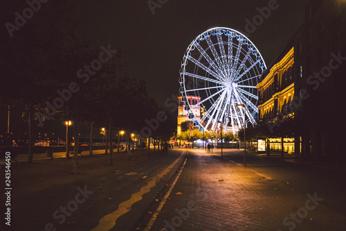 25 October 2018 Germany, Dusseldorf. North Rhine. City center, the embankment of the river. Saray Town Hall and the Ferris Wheel in the fall in overcast weather