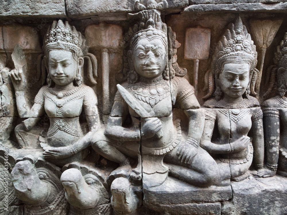 Apsara dancers in Angkor Wat on the wall of Leper king temple.