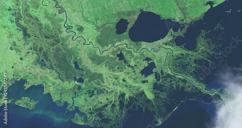 Hurtling toward earth, out of control, over the Mississippi River delta. Vibration and camera shake. Elements of this image furnished by NASA