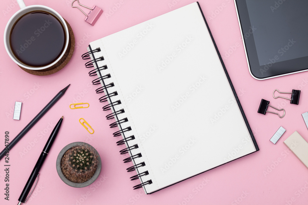 Top view workspace mockup on pink background with notebook, cactus, pen, pencil, cup of coffee, clips and accessories. Mockup Top view workspace mockup on pink background with notebook, cactus, pen, pencil, cup of coffee, clips and accessories. Mockup