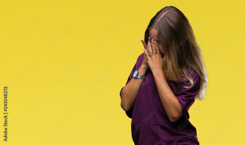 Young beautiful blonde elegant woman over isolated background with sad expression covering face with hands while crying. Depression concept. Young beautiful blonde elegant woman over isolated background with sad expression covering face with hands while crying. Depression concept.