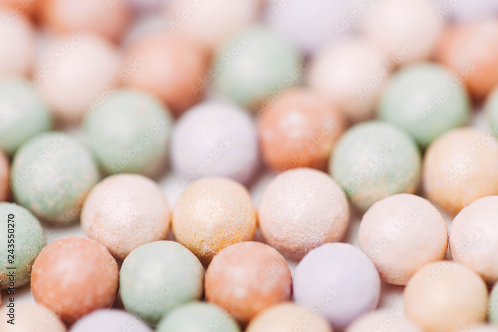 Multicoloured corrector face powder balls for make up isolated on white. Multicoloured corrector face powder balls for make up isolated on white.