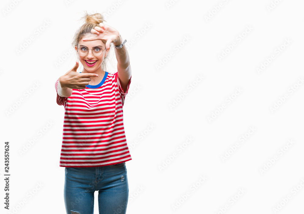 Young beautiful blonde woman wearing glasses over isolated background smiling making frame with hands and fingers with happy face. Creativity and photography concept. Young beautiful blonde woman wearing glasses over isolated background smiling making frame with hands and fingers with happy face. Creativity and photography concept.