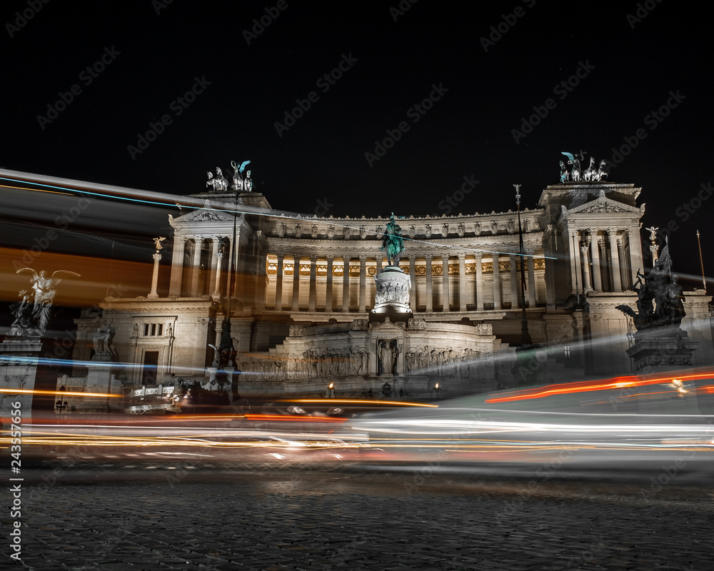 Vittoriano gigantic white monument in the centre of Rome, built to commemorate Victor Emanuele II, the first king of the unified Italy.. Long exposure photo, night lights