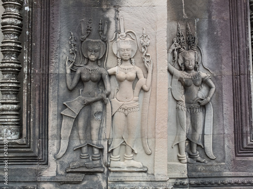 Apsara dancers on a wall of Angkor Wat, cambodia. photo