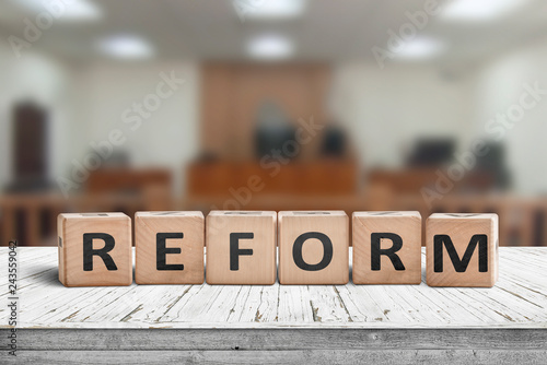 Reform sign on a desk with a blurry background photo