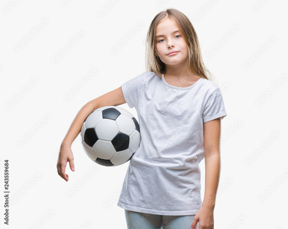 Young beautiful girl holding soccer football ball over isolated background with a confident expression on smart face thinking serious