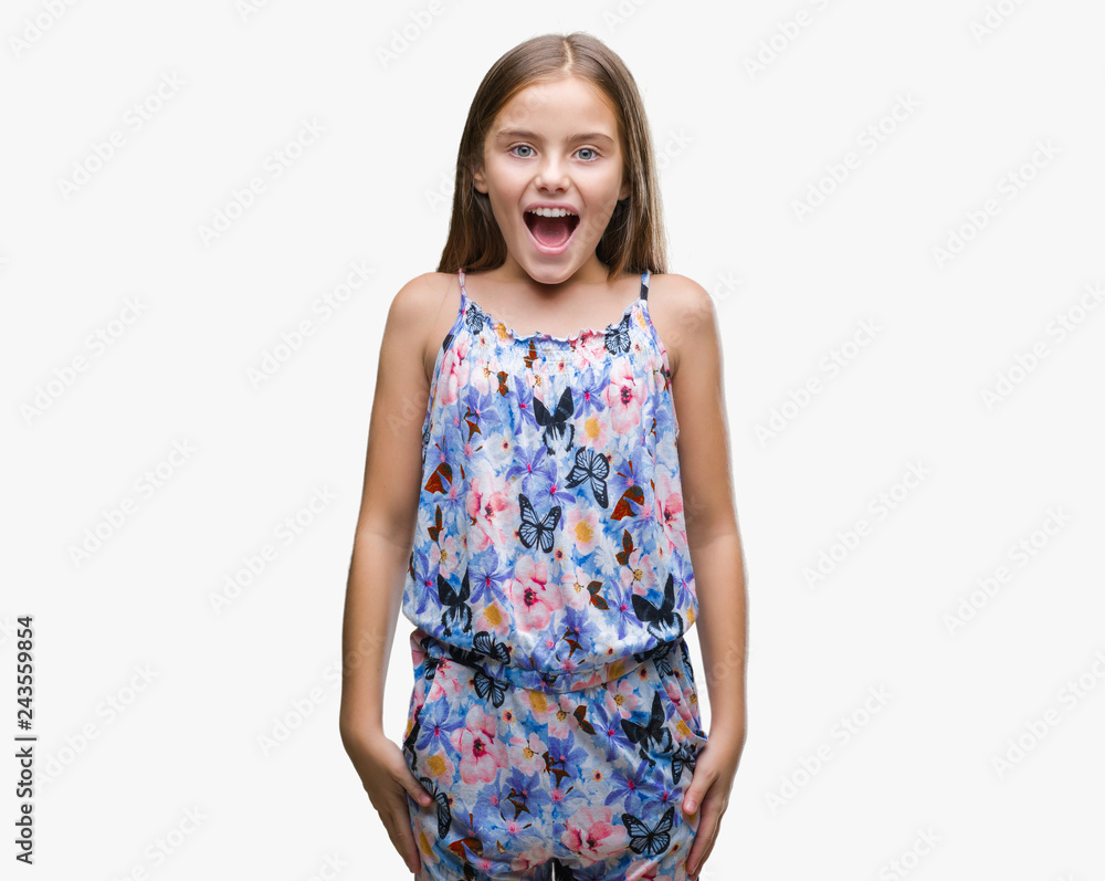 Young beautiful girl wearing colorful dress over isolated background afraid and shocked with surprise expression, fear and excited face. Young beautiful girl wearing colorful dress over isolated background afraid and shocked with surprise expression, fear and excited face.