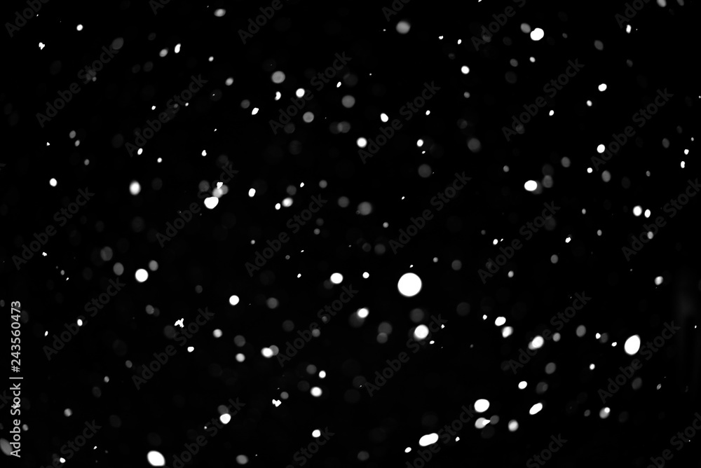 Snow on black background. Falling snow texture. Snow on black background. Falling snow texture.