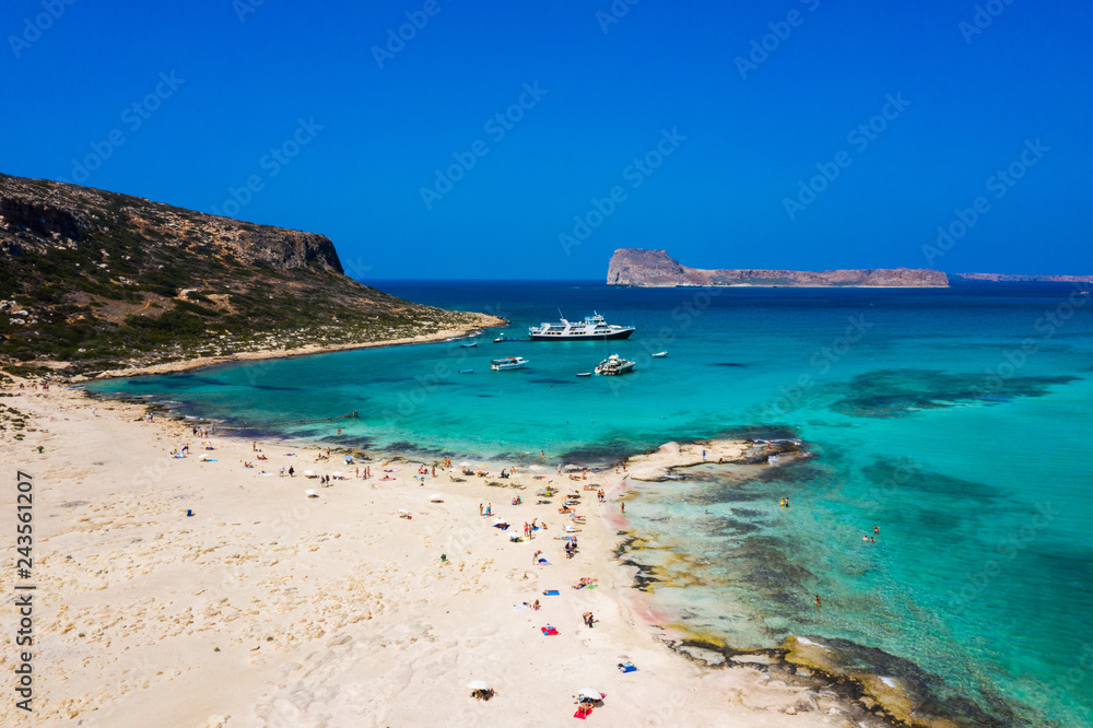 Aerial view of Balos beach near Gramvousa island in Crete. Magical turquoise waters, lagoons, Balos beach of pure white sand. Balos bay in Crete island, Greece.