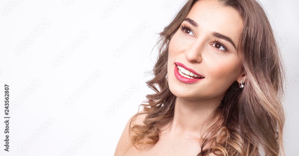 Smiling woman with beautiful white teeth. Portrait of a happy girl with clean skin and smooth teeth. Smiling woman with beautiful white teeth. Portrait of a happy girl with clean skin and smooth teeth.