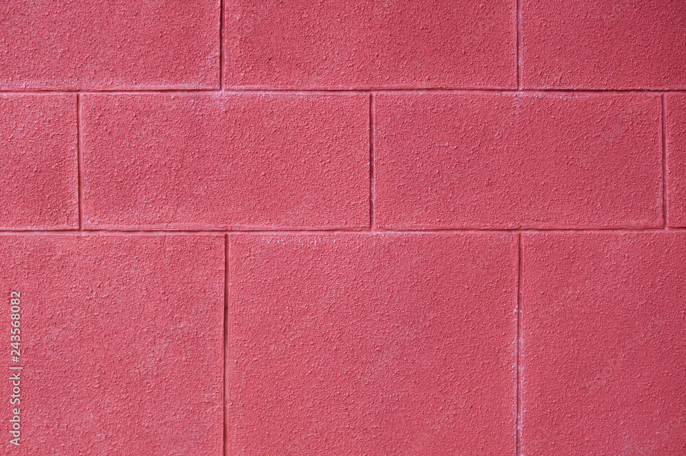 Fototapeta premium wall of brick painted red background. texture.