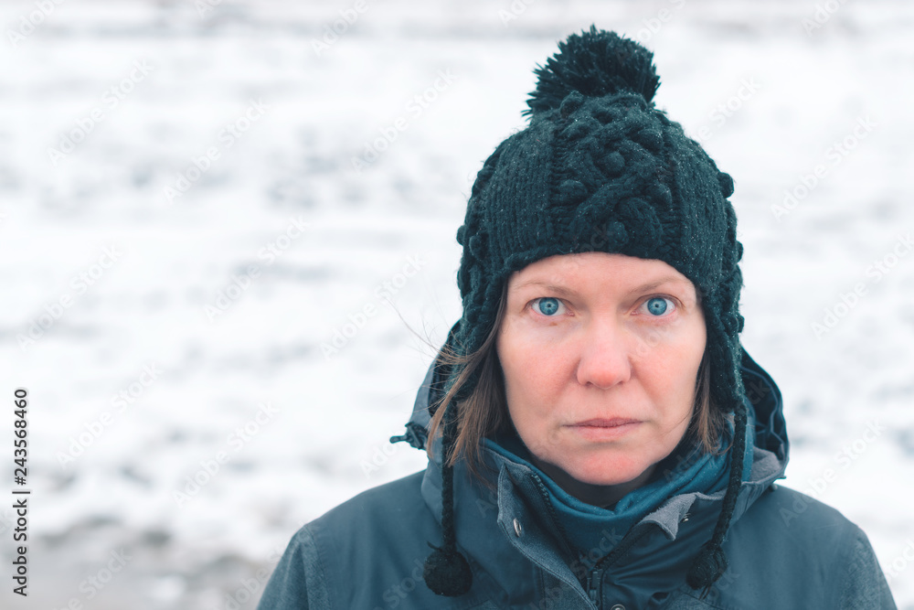 Portrait of concerned woman in snowy outdoors Portrait of concerned woman in snowy outdoors