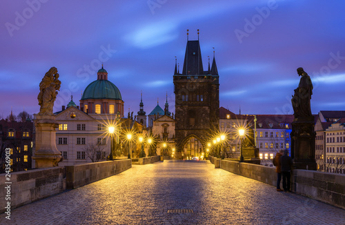 Morning view of Charles Bridge in Prague, Czech Republic. The Charles Bridge is one of the most visited sights in Prague. Architecture and landmark of Prague