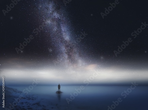 Surreal sea at night landscape with field under stars.